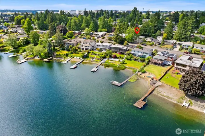 House is on the street closest to the lake.