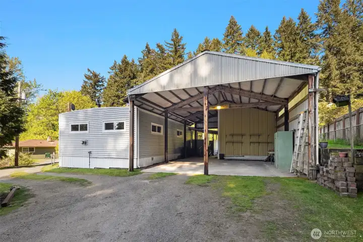 36x24 Open Bay. 11.5 feet tall clearance. Classic 1967 and in great shape Mobile home. Machine Shop on right inside 13x12 feet w bonus storage upstairs.24 Feet deep two stalls