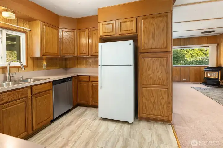 Kitchen with new sink and microwave with updated stove, Dishwasher, and Fridge