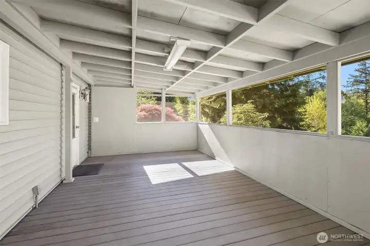 Covered porch on opposite side of home