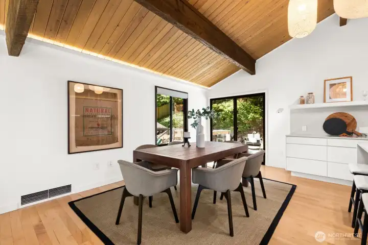 Dining area has sliding doors out to the back deck.