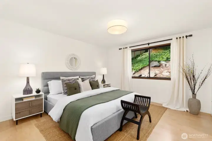 Head down the hall on the main floor to the primary en-suite!