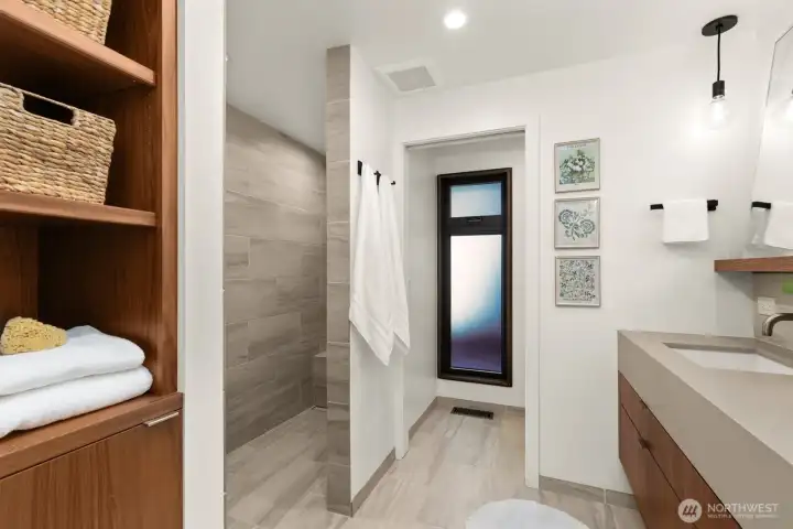 Note the walk-in shower to the left, water closet straight ahead.