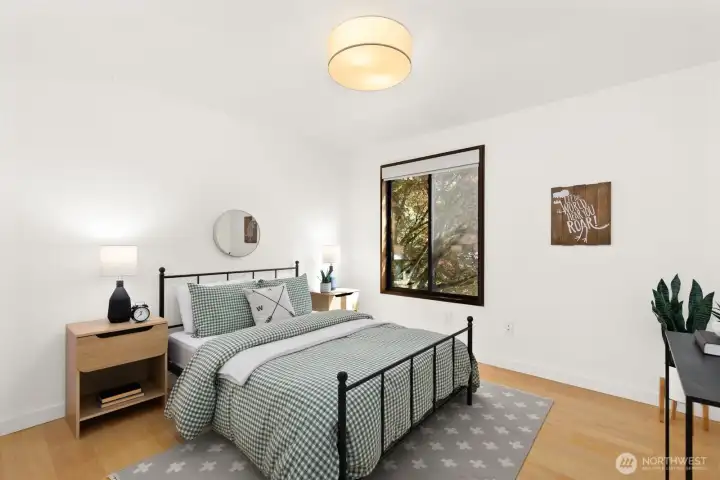 The second of the two remaining bedrooms on the main floor.