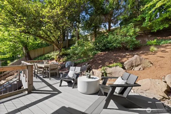 Head outside from the kitchen and you'll find multiple decks (recently rebuilt) with seating areas. Adventure areas above for those who want to explore!