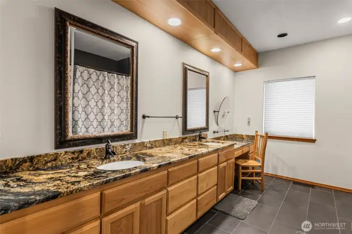 Main Bathroom with Dual Sinks and Shower/Tub Combo