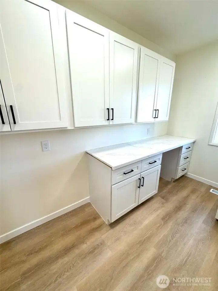 Pantry area with space for freezer. Pantry area with space for freezer.