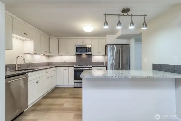 Custom island with extra storage and counter seating.