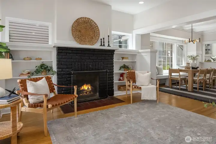 Light filled living room with wood fireplace