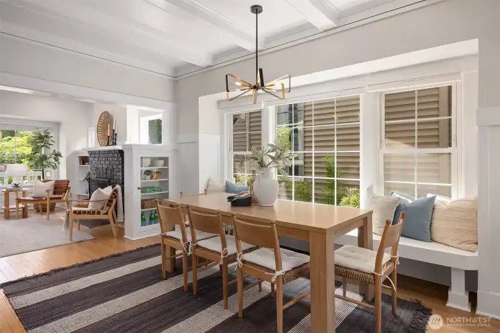 Generous dining room with tall ceilings and built in seating