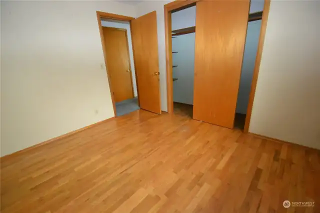 Bedroom shows the hardwood floors