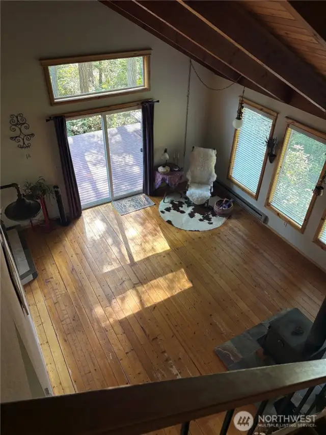 Living room empty from top of stairs