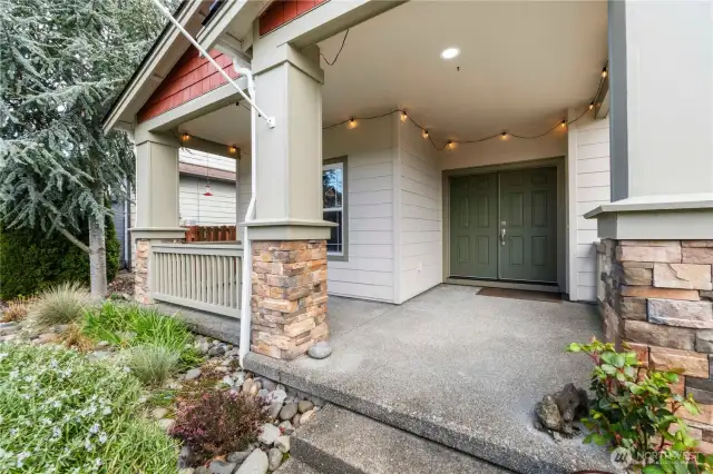 Front entrance with a large covered porch