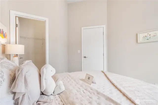 Bedroom 1 with a walk-in closet