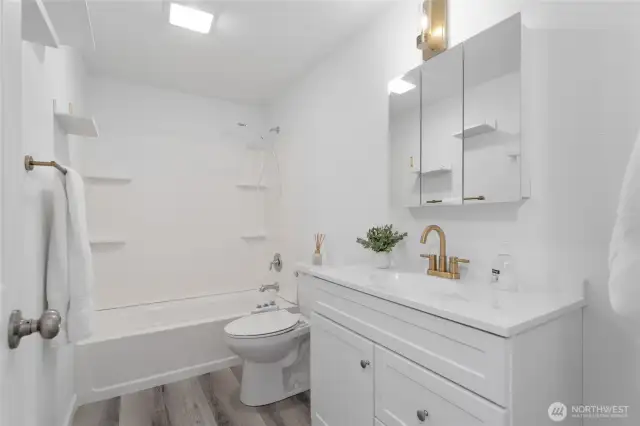 Spacious and elegant second full bathroom also conveniently located on the main floor