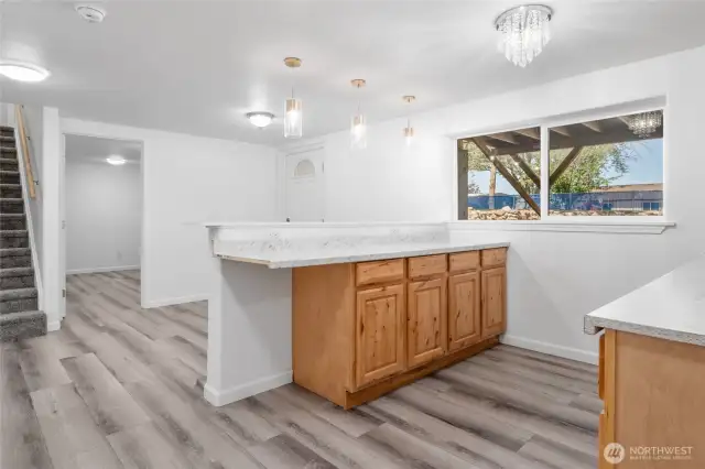 Designed for flexibility—this private-entry lower level includes two bedrooms, a second kitchen, spacious family room, a bathroom and plenty of storage—perfect for guests, in-laws, or tenants