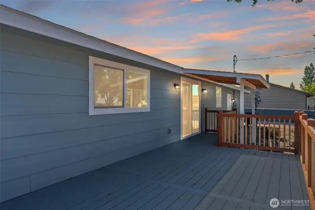 Perfect for entertaining or relaxing—large rear deck, fenced and terraced backyard, and dual kitchens in a versatile 5BR/3BA home with investment upside