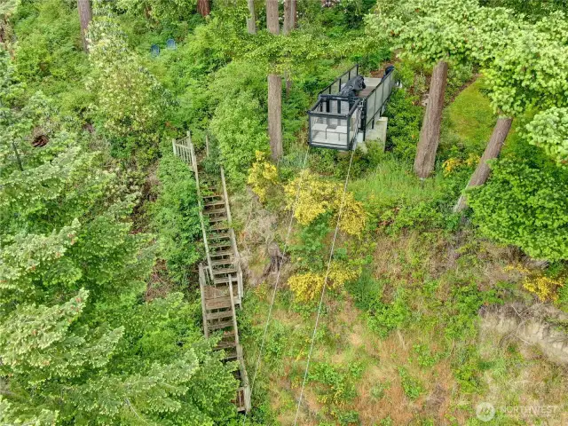 Private Custom Cable lift provides direct access from the bluff to the properties beach/shoreline, in addition, to access to the private mooring buoy.