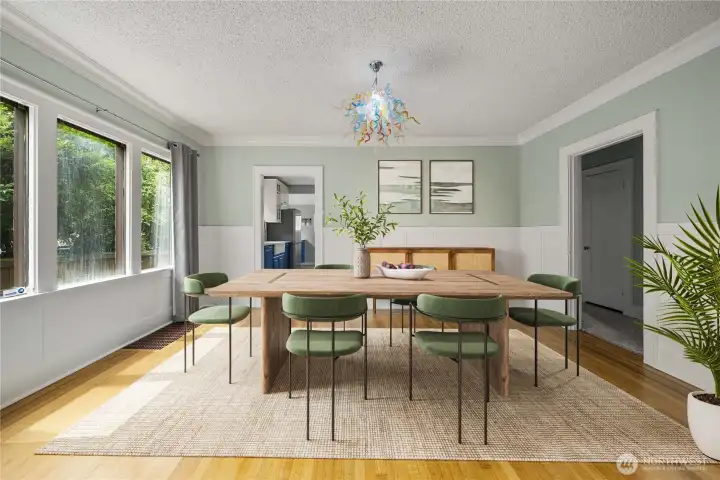 Large formal dining room with triple-bank of south-facing windows.