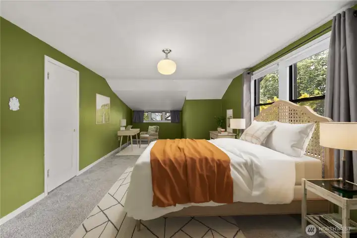 This huge upstairs bedroom is on the south east corner of the home, full height ceiling except for small area with east-facing dormer windows can be seen.