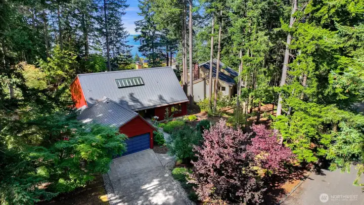 This Beautifully designed home  is located in the coveted Edgemoor neighborhood. Enjoy a secluded sanctuary with Bellingham Bay views from a park-like setting.