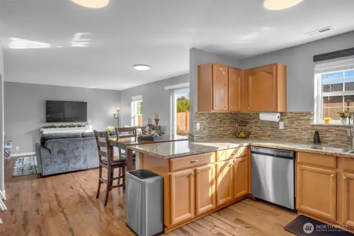 Half wall kitchen so you can converse with guests.
