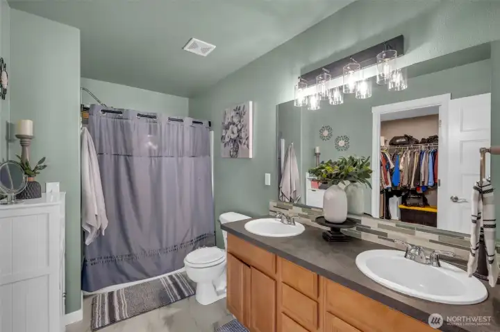 Primary bedroom bath. Double sinks and great walk in closet.