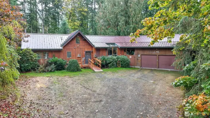 Lindal Cedar Home on .86 of an acre with oversized garage, covered RV parking, Gazebo, potting shed. Walking distance to Nolte State Park and Fish Lake.
