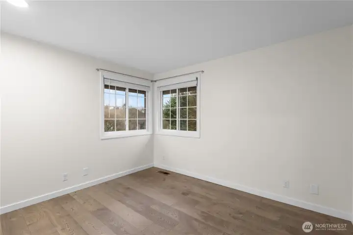 Bedroom #3 located on the upper level. This room is sunny & spacious.