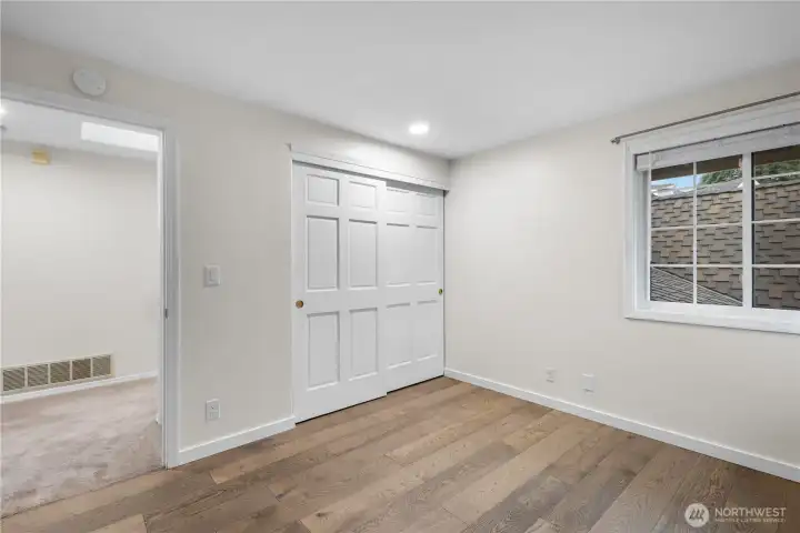 Notice the handsome engineered hardwood floors!