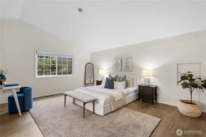 The primary bedroom is a special haven. Roomy, private, grand.