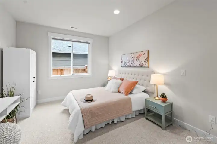 Flexible third bedroom or office/den with French doors, offering a private space ideal for working from home, guests, or creative use within this upgraded single-level McCormick Trails home.
