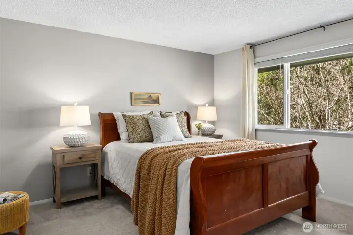 Primary bedroom with en-suite bath and walk in closet