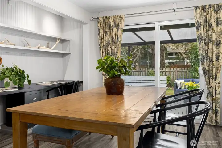 Another dining area with access to backyard