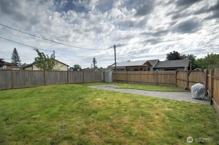 Fully fenced backyard with plenty of space for entertaining, gardening, pets, or play. Private setting with patio area offers great potential for outdoor living and relaxation.