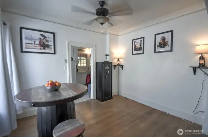 Charming dining area with hardwood floors, abundant natural light, and classic character—perfect for everyday meals or gathering with guests.