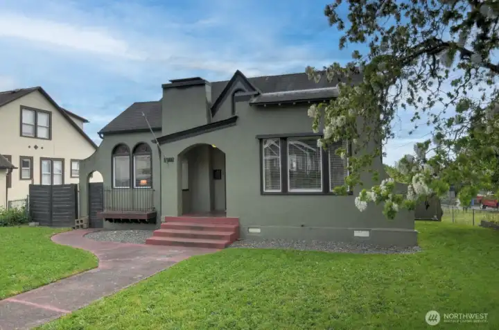 Charming Craftsman-style home featuring timeless architecture, inviting curb appeal, and mature landscaping in a convenient Chehalis location.