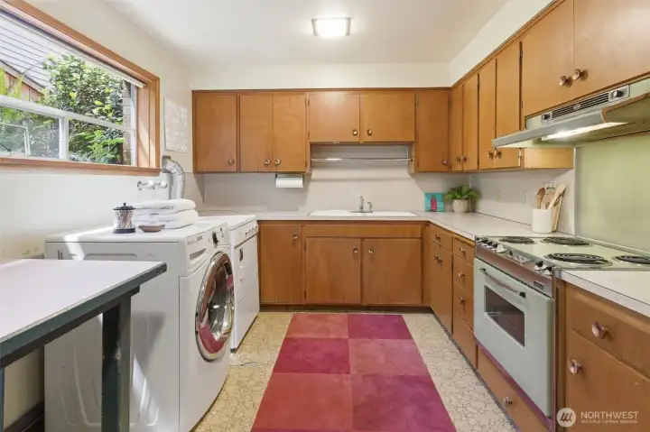 Laundry room with second kitchen. Laundry room with second kitchen.