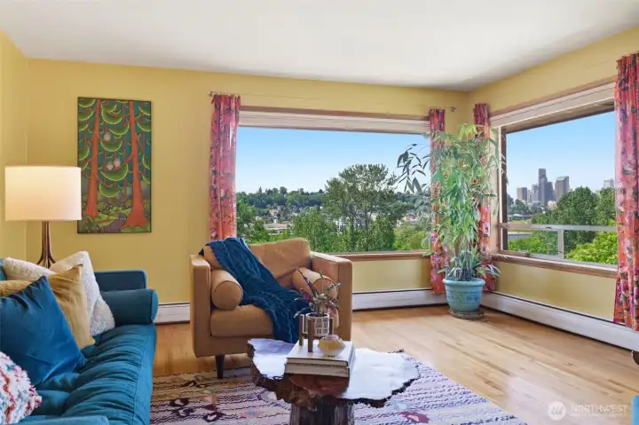 Even better views from the main floor living room looking out toward the city. Even better views from the main floor living room looking out toward the city.