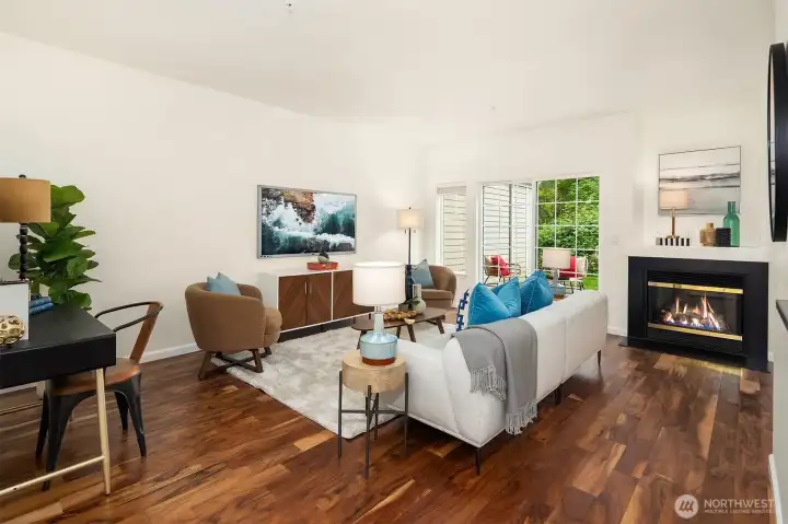 There is a sliding glass door that leads to your patio and grassy area beyond.