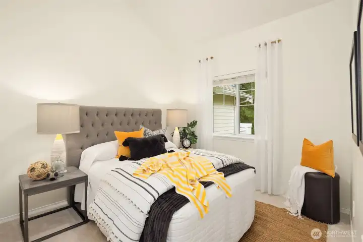 Both bedrooms are ensuite and both overlook the rear grassy area. This is the secondary bedroom.