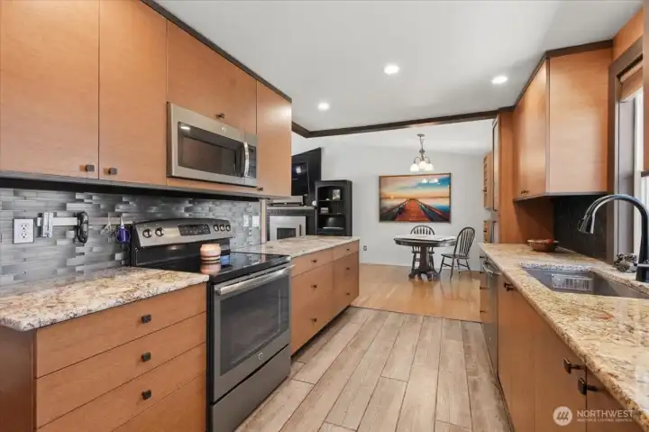 Kitchen opens up to the dining room and living room.