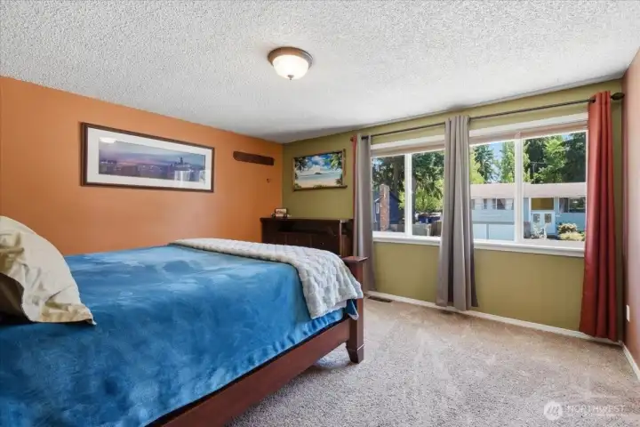 The primary bedroom can comfortable accommodate a king sized bed plus furniture.