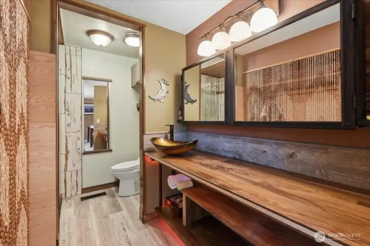 There is a large vanity with storage below.  To the left is a closet.