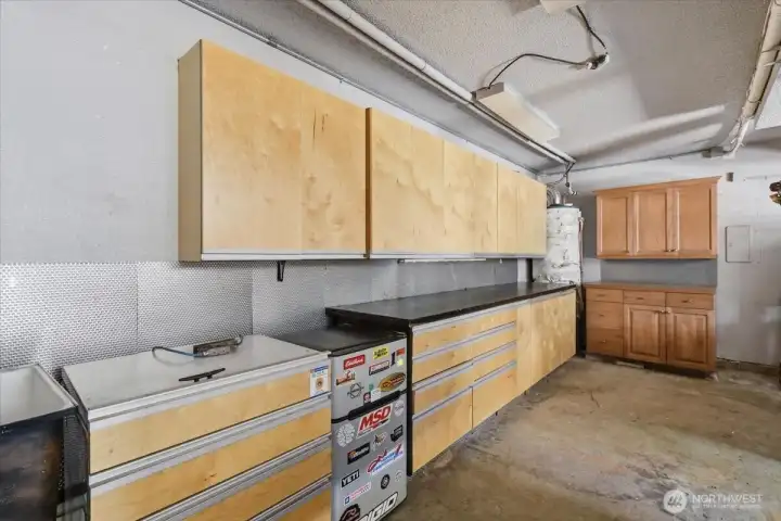 The oversized garage has plenty of workspace.