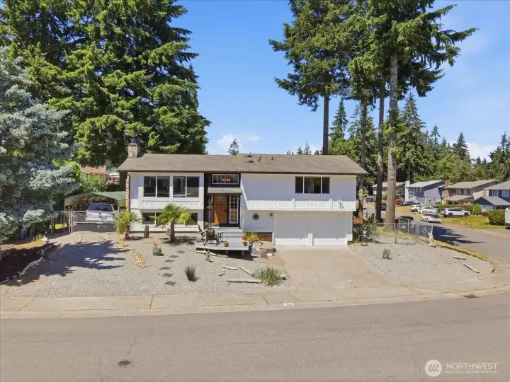 Home is on a spacious corner lot.