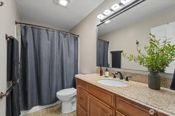 Bath 1 - Full - tub/shower, toilet, sink