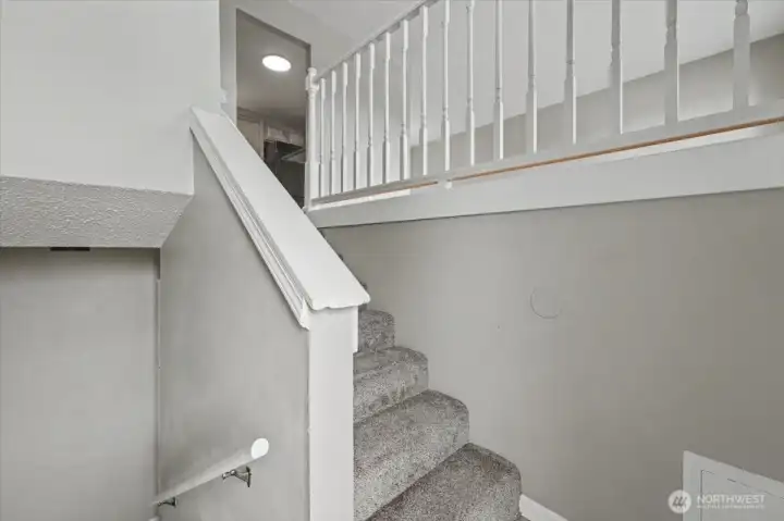 Main door entry landing - with stairs up and down
