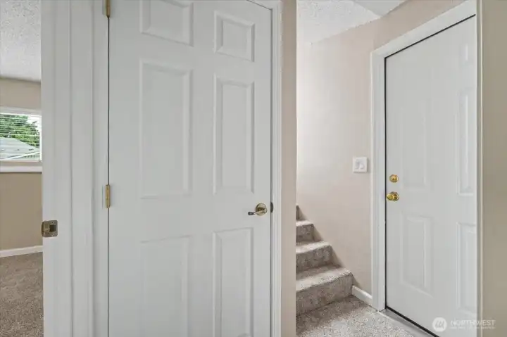 Storage under stairs in basement.