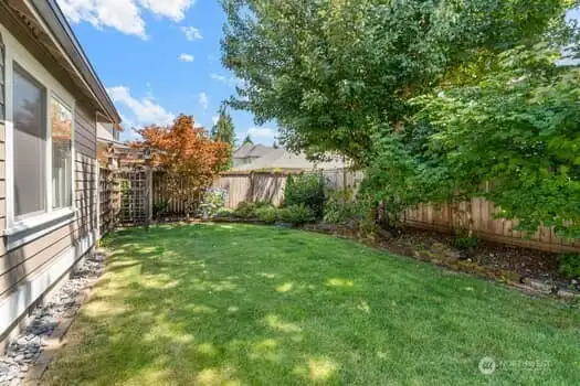 REAR GRASSY YARD!!!